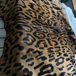 Rug bought and never used it. It's real Jaguar bought from the amish